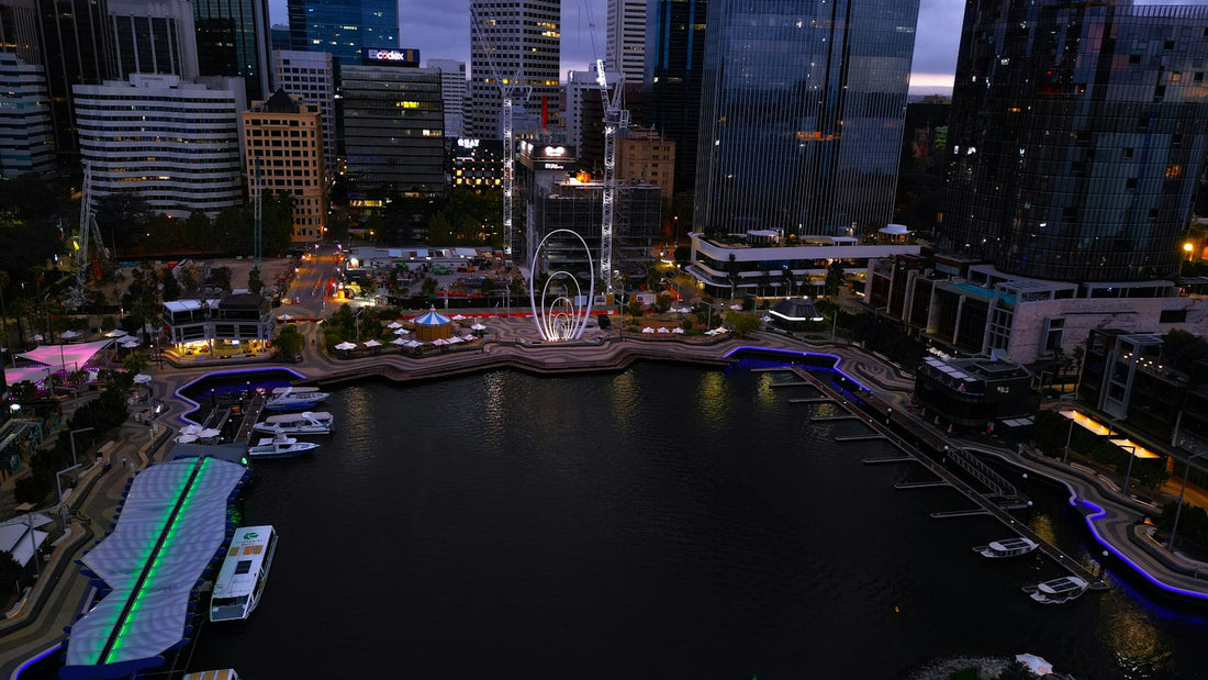 Elizabeth Quay and the Perth city skyline reflected in the Swan River at dawn